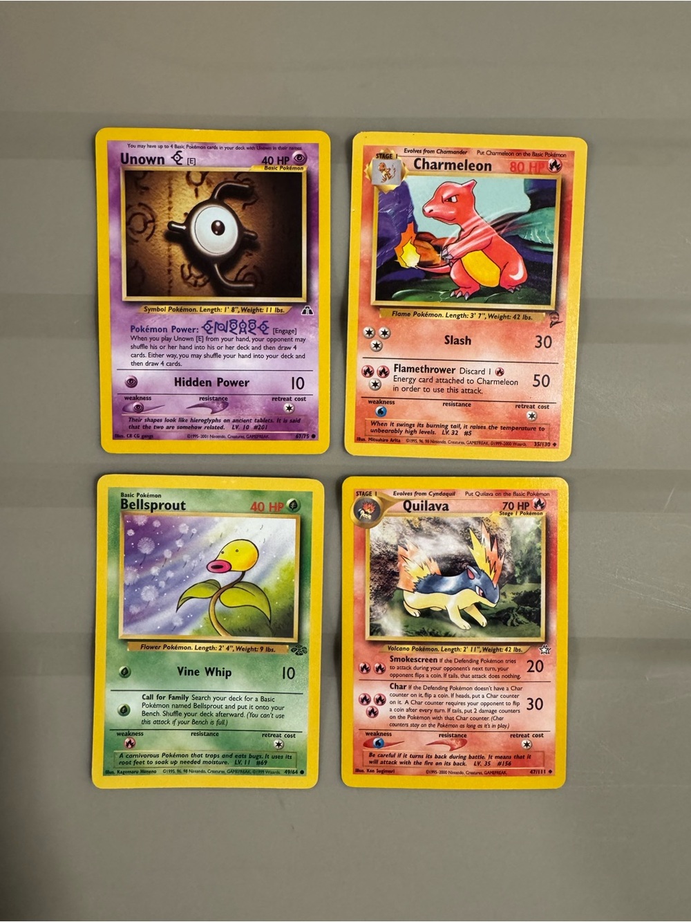 A collection of early Pokémon TCG cards from the 1990s and early 2000s. Set of 4